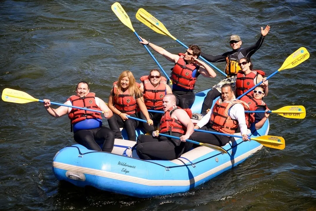 A group rafting on the channel
